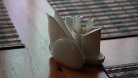 Close-up.  empty cafe napkins clean, paper, on a set table Stock Footage 131761658