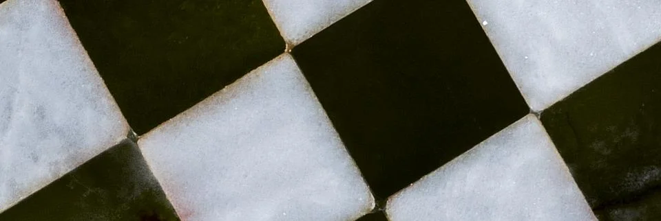 Close up of empty chessboard background. Top view. Stock Photos