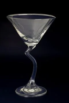 Close up of an empty cocktail or a mock tail glass against a black background Stockfoto's