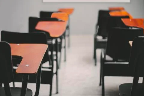 Close-up of empty desks in classroom, concept social distancing Foto stock