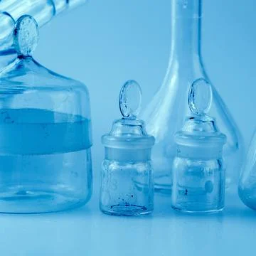 Close up empty flasks. Laboratory analysis equipment. Chemical laboratory, gl Stock Photos