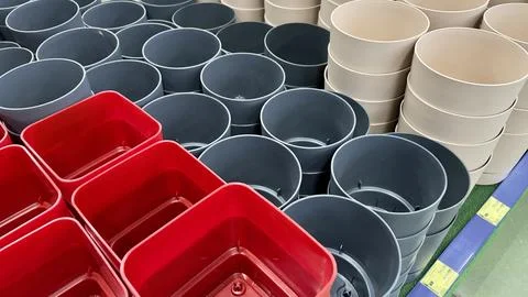 Close-up of empty flower pots in a store or greenhouse. Colorful pots for plants Stock Photos