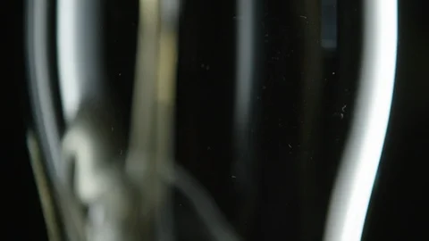 Close up of empty glass being filled with golden beer Stock Footage 93562584