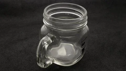 Close up of empty glass cup isolated Stock Photos
