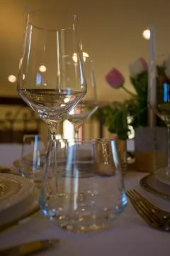 Close up of empty glasses on a banquet table. Stock Photos