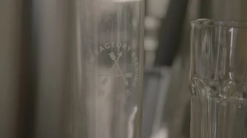 Close-Up of Empty Glasses on Counter in Beijing Brewery Interior Stock Footage 345756446