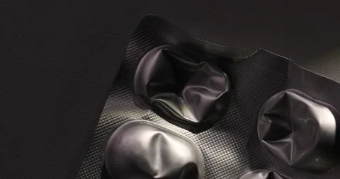 Close-up of an Empty Metallic Blister Pack Stock Footage 296158076