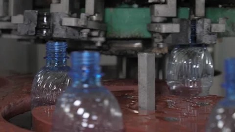 Close up. Empty plastic bottles are moved on a conveyor belt. Stock-Footage 265225915