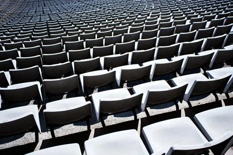 Close up of empty seats in stadium Stock Photos