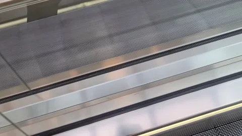 Close up of empty steps of an escalator in a perspective view. 動画素材 157819868