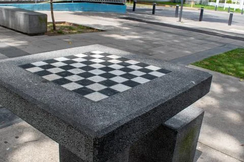 Close-up of an empty stone outdoor chess table in Guadalajara, Mexico Stock Photos