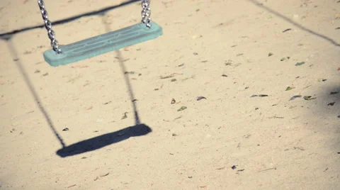 Close up of empty swing in a playground Stock Footage 45988278