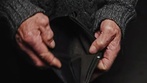 Close up Empty wallet in senior hands, opens and empty, no money. Poverty in Stock Footage 206851160