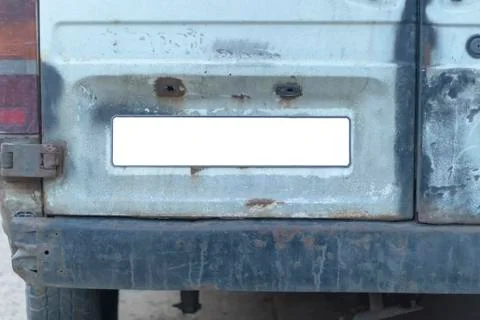 Close-up Of A Empty White Number Plate On dirty Car, copy space Stock Photos
