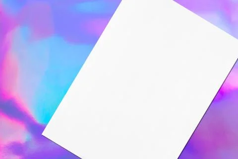 Close up of empty white rectangle poster mockup lying diagonally on holograph 스톡 일러스트