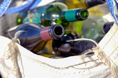 Close Up of Empty Wine Bottles in a Bag Stock Photos
