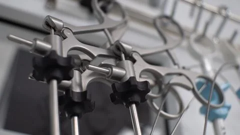 Close-up. Endoscopic instrument lying on the table. Black screws to control the Stock Photos