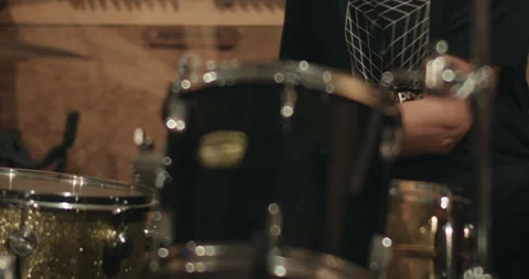 Close up energetic rock and roll tattooed drummer 4K Stock Footage 240874286