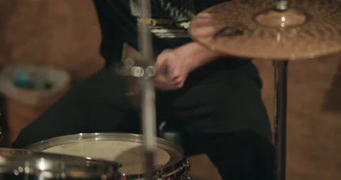Close up energetic rock and roll tattooed drummer 4K Video stock 240875000