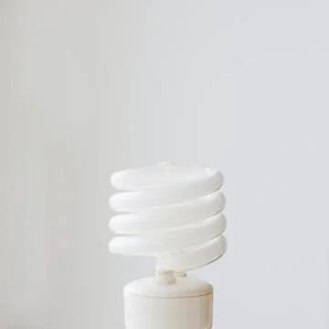 Close up of energy efficient light bulb Stock Photos