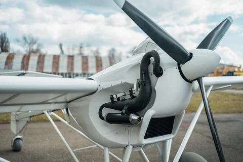 Close up of engine and propeller of remote radio controlled light airplane Stock Photos