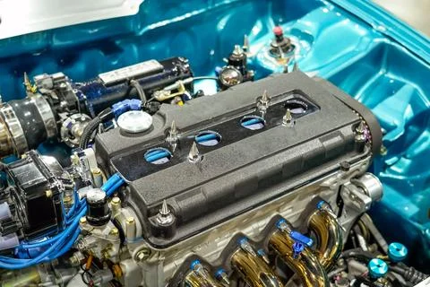 Close-up of the engine, front top view, show all parts and open hood. Stock Photos