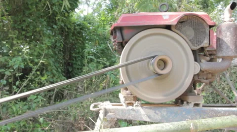 Close-up of engine of pushcart working with rubber belt Stock Footage 64876290
