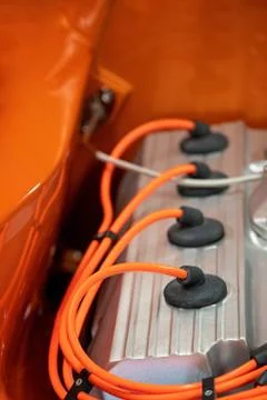 Close Up Of Engine Spark Plus Of Orange Classic Car Foto stock