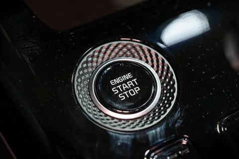 Close up of engine start stop button in car console Foto stock