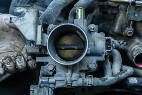 Close-up of the engine, throttle, raditor. Engine breakdown: contaminated thr Fotos Stock
