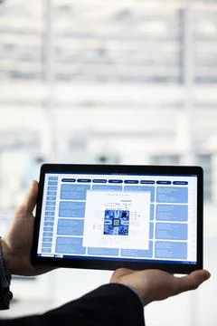 Close up of engineer doing microchips yield enhancement using tablet Stock Photos