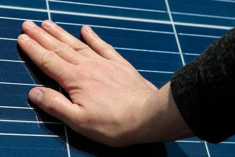 Close up of an engineer hand is checking an operation of sun and cleanlines.. Foto stock