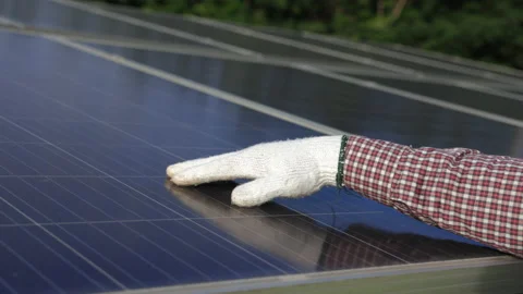 Close up engineer hand touch the solar cell panels. Technician checking and inst Stock-Footage 158902631