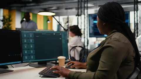 Close up of engineer in office using AI LLM chatbot to get help Stock Footage 322704140