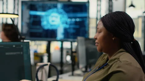 Close up of engineer in office using AI LLM chatbot to get help Stock Footage 323406120