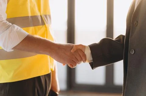 Close up engineer shake hand on site construction , Shake hand ,hand shake .. Stock Photos