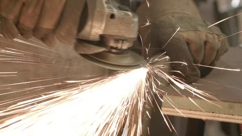 Close-up of an engineer using an angle grinder Stock-Footage 74760829