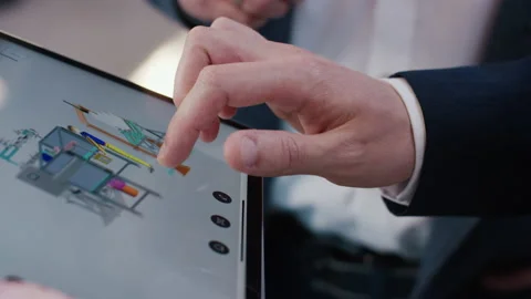 Close-up of engineer using digital tablet for 3D technical design and planning Stockbeeldmateriaal 155207425