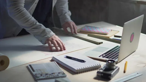 Close up Engineer works with drawings , Instruments and office for designer Stock Footage 140310589