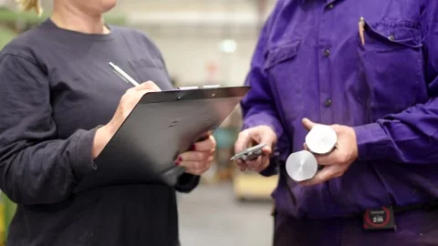 Close-up of engineers during a quality control of metal pieces Stock-Footage 258397612