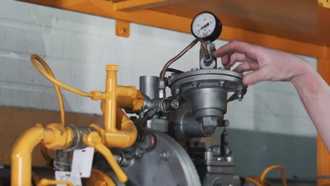 Close-up of an engineer's hand inspecting a gas distribution system. Stock Footage 306815382