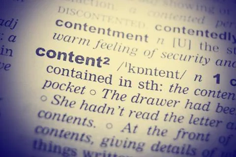 Close up of English dictionary page with word Content Stock Photos