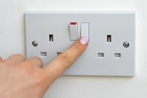 Close up of english socket in the wall Stock Photos