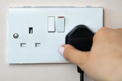 Close up of english socket in the wall Stock Photos