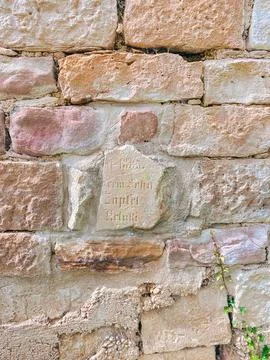 Close Up of an Engraved Stone in a Wall Stock Photos