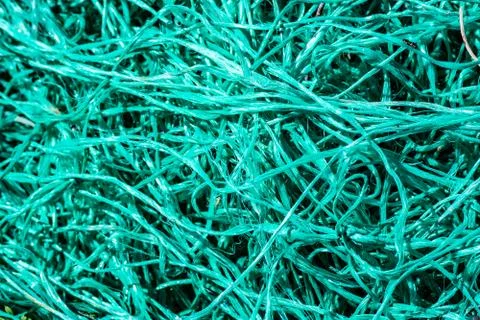 Close up of entangled turquoise nets Stock Photos