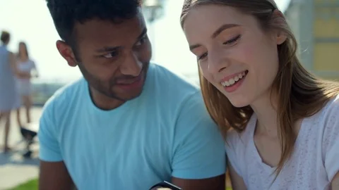 Close up of enthusiastic students comparing test results Stock Footage
