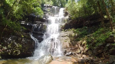 Close up of an enticing waterfall in a forest in India Stock Footage 119313934