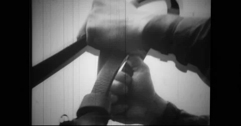 Close-up of entrance passes and trainer holding reins Stock Footage