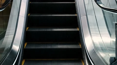 Close-up of an escalator for passengers or shoppers in a mall. Stock Footage 237384905